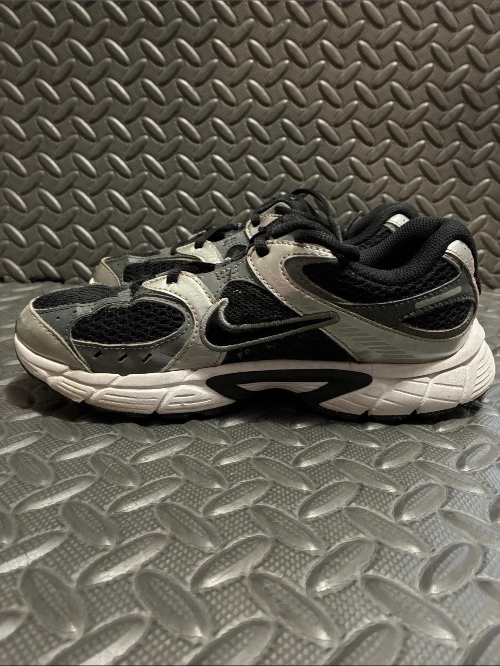 Nike Black and Silver Boys Athletic Sneakers